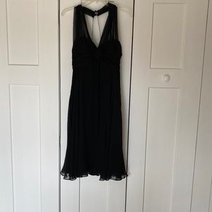 Black chiffon Teri Jon “Marilyn Monroe” inspired evening dress.